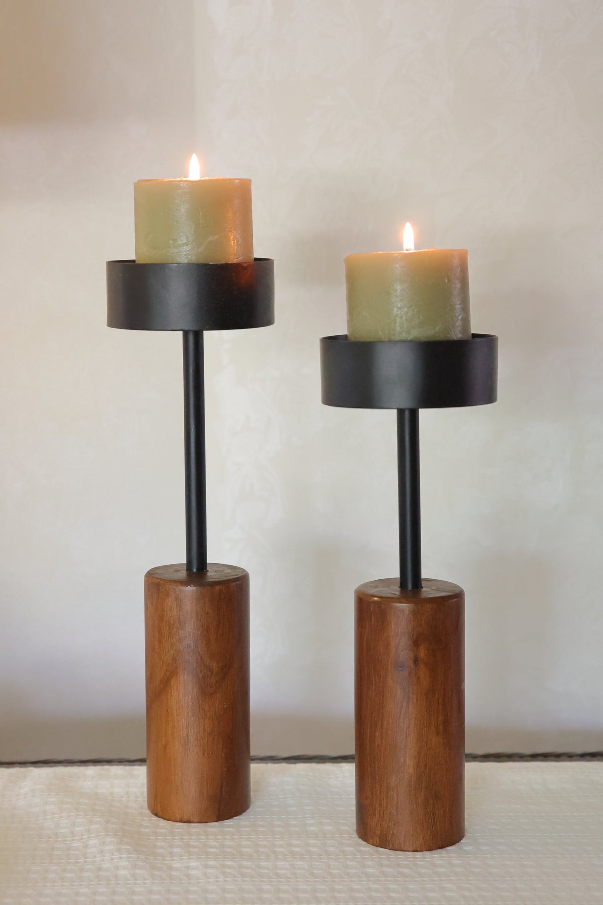 Round black candle stands